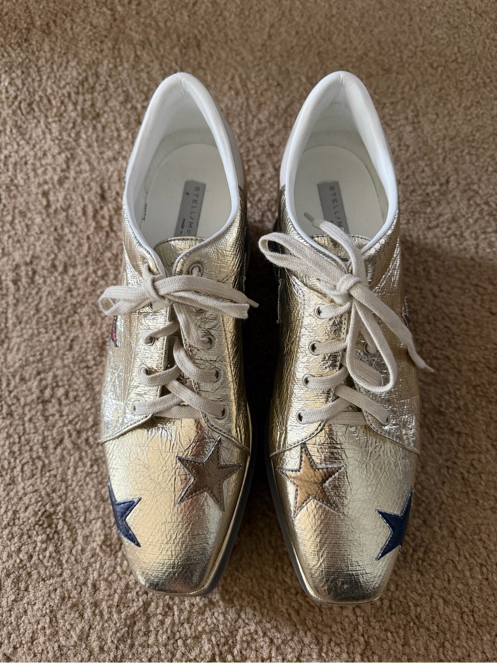 Stella McCartney Metallic Gold Lace-Up Sneakers with Star Appliqués